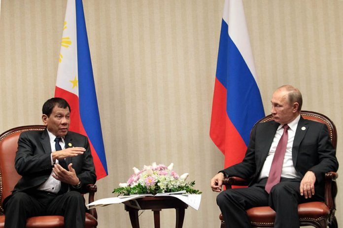 President Rodrigo Duterte and Russian President Vladimir Putin meet for the first time during a bilateral meeting at the sidelines of the Asia-Pacific Economic Cooperation (APEC) Leaders' Meeting in Lima, Peru on November 19. ROBINSON NIÑAL JR./ Presidential Photo President Rodrigo Duterte and Russian President Vladimir Putin meet for the first time during a bilateral meeting at the sidelines of the Asia-Pacific Economic Cooperation (APEC) Leaders' Meeting in Lima, Peru on November 19. ROBINSON NIÑAL JR./ Presidential Photo