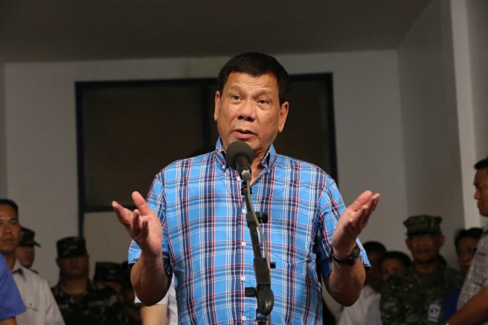 President Rodrigo Roa Duterte announces that while he could order an all-out offensive against the Abu Sayaff, he is more concerned about putting an end to the violence as it also affects the lives of the civilians in his speech during his visit at Camp General Basilio Navarro in Zamboanga City on November 25, 2016. ALBERT ALCAIN/Presidential Photo