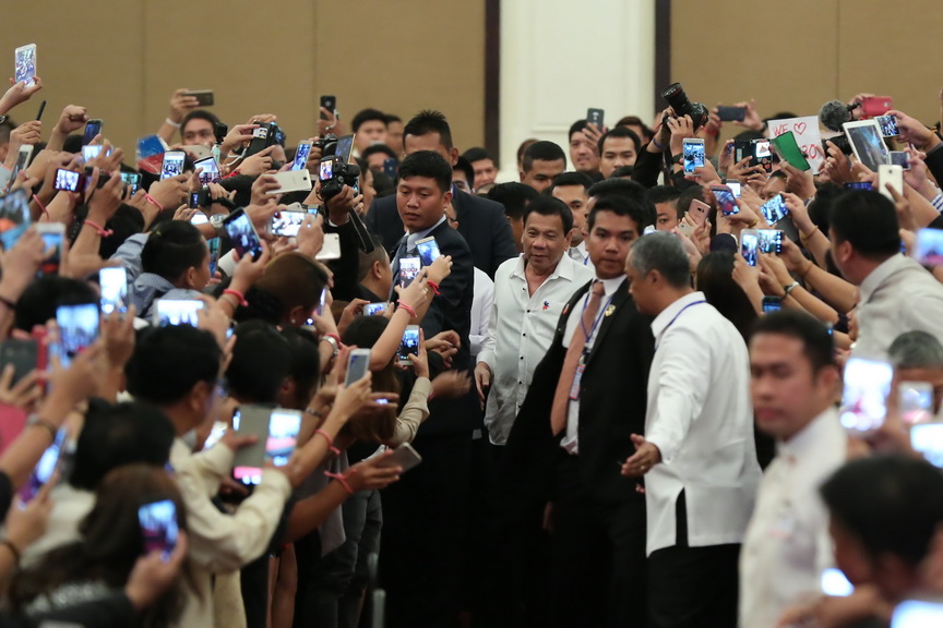 President Rodrigo Roa Duterte is mobbed by supporters upon his arrival at the Sofitel Phnom Penh Phokeethra Hotel in Cambodia on December 13, 2016. KING RODRIGUEZ/Presidential Photo