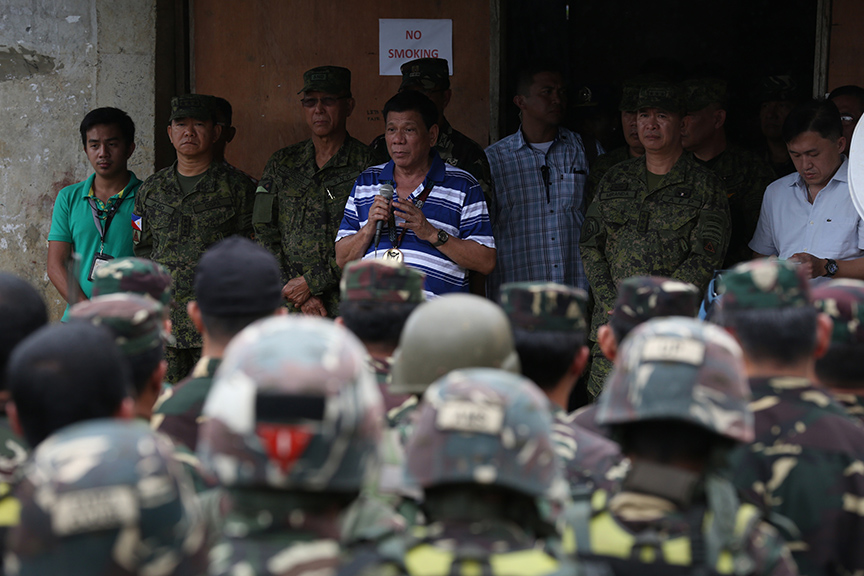 President Rodrigo Roa Duterte attends a command briefing at the 103rd Brigade Camp in Lumbayanague town, Lanao del Sur on November 30,2016. TOTO LOZANO/Presidential Photo
