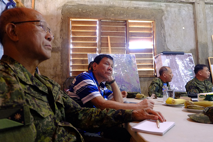 President Rodrigo Roa Duterte attends a command briefing at the 103rd Brigade Camp in Lumbayanague town, Lanao del Sur on November 30,2016. TOTO LOZANO/Presidential Photo