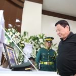 President Rodrigo Duterte visits the wake of the late Captain Clinton Capio at the mortuary of the Libingan ng mga Bayani in Fort Bonifacio on January 16, 2017. Capio, a Philippine Military Academy Class 2006, was killed in a clash with the Abu Sayaff members last Thursday. KING RODRIGUEZ/ Presidential Photos