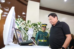 President Rodrigo Duterte visits the wake of the late Captain Clinton Capio at the mortuary of the Libingan ng mga Bayani in Fort Bonifacio on January 16, 2017. Capio, a Philippine Military Academy Class 2006, was killed in a clash with the Abu Sayaff members last Thursday. KING RODRIGUEZ/ Presidential Photos