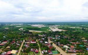 Continuous rains have inundated the town proper of Kapalong in Davao del Norte on Tuesday morning. Photo Courtesy of PTV/ Davao del Norte PIO