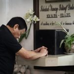 President Rodrigo Roa Duterte spends a solemn moment at the grave of his mother Soledad 'Nanay Soling' Duterte at the Davao Catholic Cemetery to commemorate her death anniversary on February 4, 2017. KARL NORMAN ALONZO/ Presidential Photo