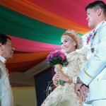 President Rodrigo Roa Duterte extends his well-wishes to the newly-wed couple Senior Inspector Alvin Hosmillo and Senior Inspector Alnieza Kinang-Hosmillo during the reception at the Astoria Regency Convention Center in Zamboanga City on February 12, 2017. The President is one of the principal sponsors for the Kinang-Hosmillo nuptials. The couple caught the public's eye after Hosmillo made a public proposal to Kinang who was among the aide-de-camp of the President during an event at the Police Regional Office 13 sometime in October last year. ALBERT ALCAIN/Presidential Photo