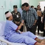 President Rodrigo Roa Duterte shakes the hands of 2Lt. Daniel De Guzman, one of the soldiers wounded-in-action in an encounter with the New Peoples Army recently. The President awarded the Wounded Personnel medal to the soldiers during his visit at Camp Evangelista Station Hospital in Cagayan de Oro City on March 3, 2017.ALBERT ALCAIN/Presidential Photo