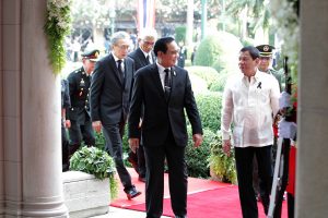 President Rodrigo Roa Duterte is accompanied by Thailand Prime Minister General Prayuth Chan-o-cha as they enter the Thai Koo Fah Building of the Government House in Bangkok, Thailand on March 21, 2017. KING RODRIGUEZ/Presidential Photo