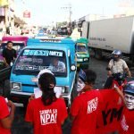 Supporters of the communist movement hold a lightning rally at Bankerohan, Davao City on Wednesday, March 29, commemorating the 48th Anniversary of the New People’s Army, the armed wing of the Communist Party of the Philippines. Newsline Photo