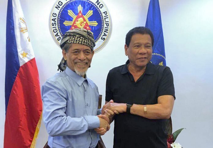 President Rodrigo Roa Duterte meets with Moro National Liberation Front (MNLF) chairman Prof. Nur Misuari at the Presidential Guest House in Davao City on March 27, 2017. Misuari is accompanied by his wife, Madam Tarhata and son, Abdulkarim. RENE LUMAWAG/Presidential Photo