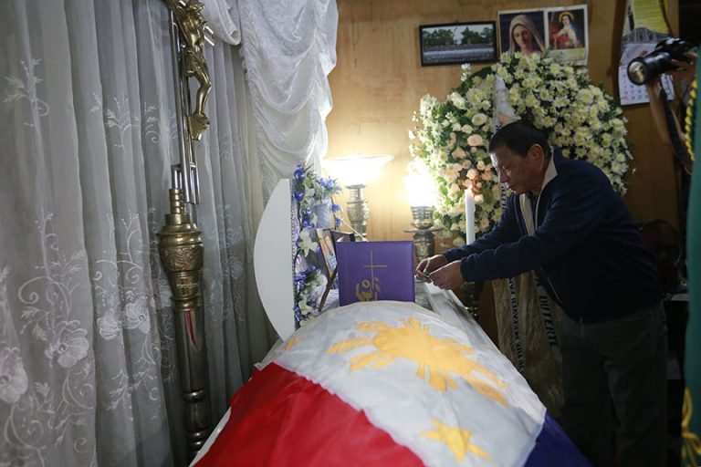 Right after President Rodrigo Roa Duterte's arrival from a successful visit to three countries in the Middle East, he goes straight to the wake of the late 2Lt. Estilito Saldua, Jr. in San Jose, Batangas on April 17, 2017. Here the President awards a posthumous medal to Saldua who was killed while thwarting the terror attack of the Abu Sayyaf Group in Bohol recently. REY BANIQUET/Presidential Photo