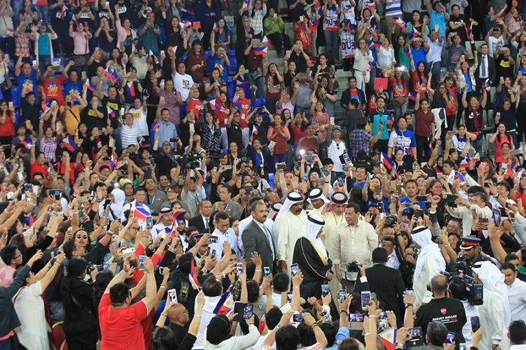 President Rodrigo Roa Duterte is swarmed by supporters upon his arrival at Khalifa Sports City in Bahrain on April 14, 2017 for the meeting with the Filipino community.ACE MORANDANTE/Presidential Photo