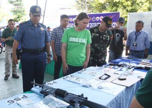 Davao City Mayor Sara Duterte and City Police Director Sr. Supt. Alexander Tagum inspects evidence gathered after a a joint operation on Friday (19 May 2017) of police and military units in 10 barangays in Davao City that targeted drug personalities, wanted persons, illegal firearms and known criminal and terror suspects. Five persons were killed after a firefight with the security forces and at least 65 others were arrested. Newsline Photo
