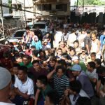 Resident of Barangay Mini Forest in Davao City gather at a covered basketball court for identification verification during the "Operation Bolabog" on Thursday. The operation was meant to verify non-residents as part of the city's tightened security measures. Newsline Photo
