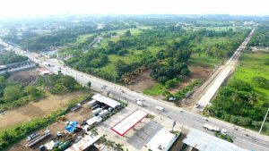 RIGHT: The road widening from Maa-Diversion (near Crocodile park) to Slaughter House Road up to F. Torres Bridge with bridge widening worth P469.4 million.-Photo: Dean Ortiz/DPWH