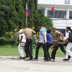 RUSHING: A PSG personnel brought to Camp Panacan Hospital after the New People's Army rebels ambushed their convoy along the Davao-Botabato-Bukidnon highway Wednesday morning. Newsline Photo