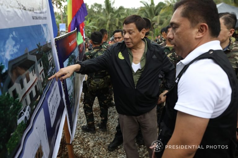 Duterte cites NHA’s Escalada for good agency performance
