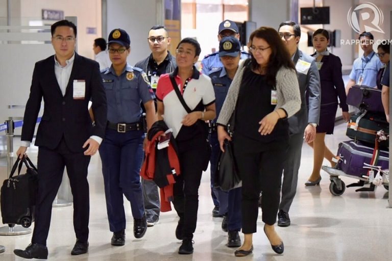 Police arrest Maria Ressa  at NAIA over dummy account, claims she is ‘treated like a criminal’