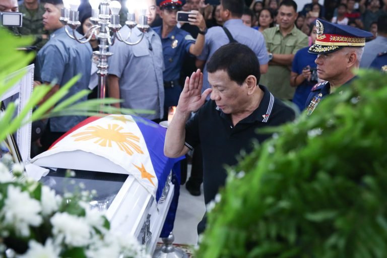 Duterte honors policemen killed by NPA rebels in Negros Oriental