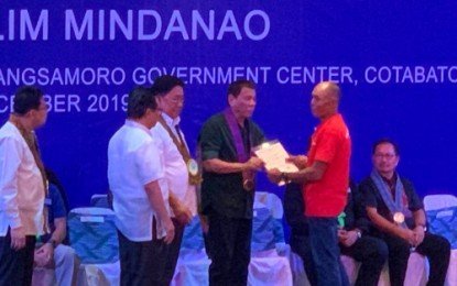 Duterte leads land titles distribution in BARMM