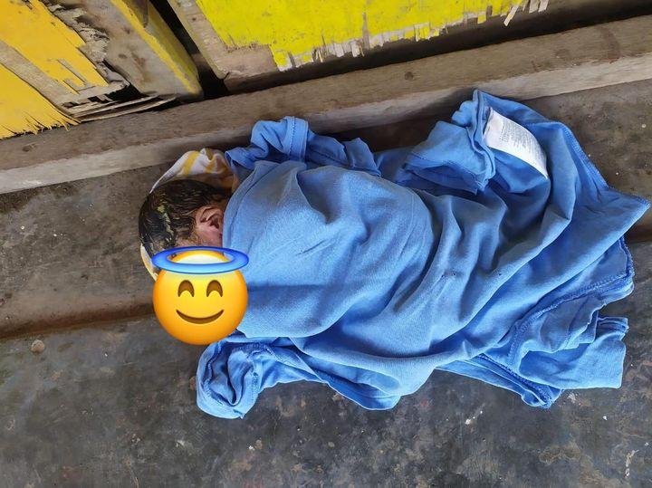 Newborn baby found  outside a store