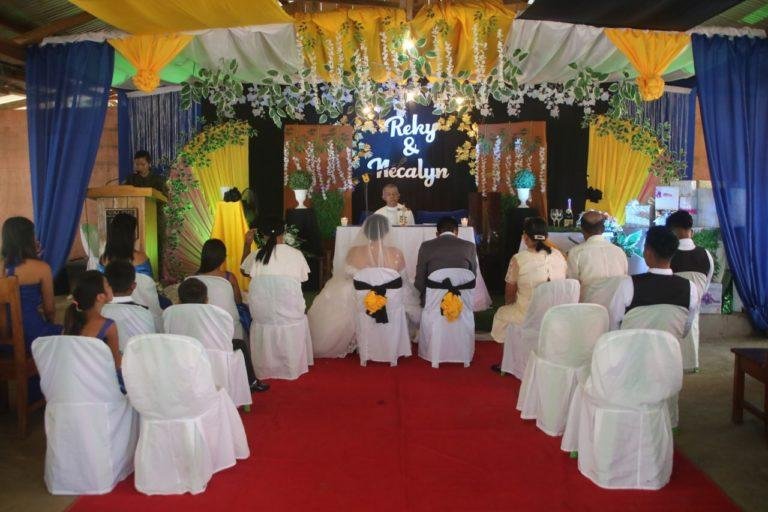 Former rebels wed inside military camp